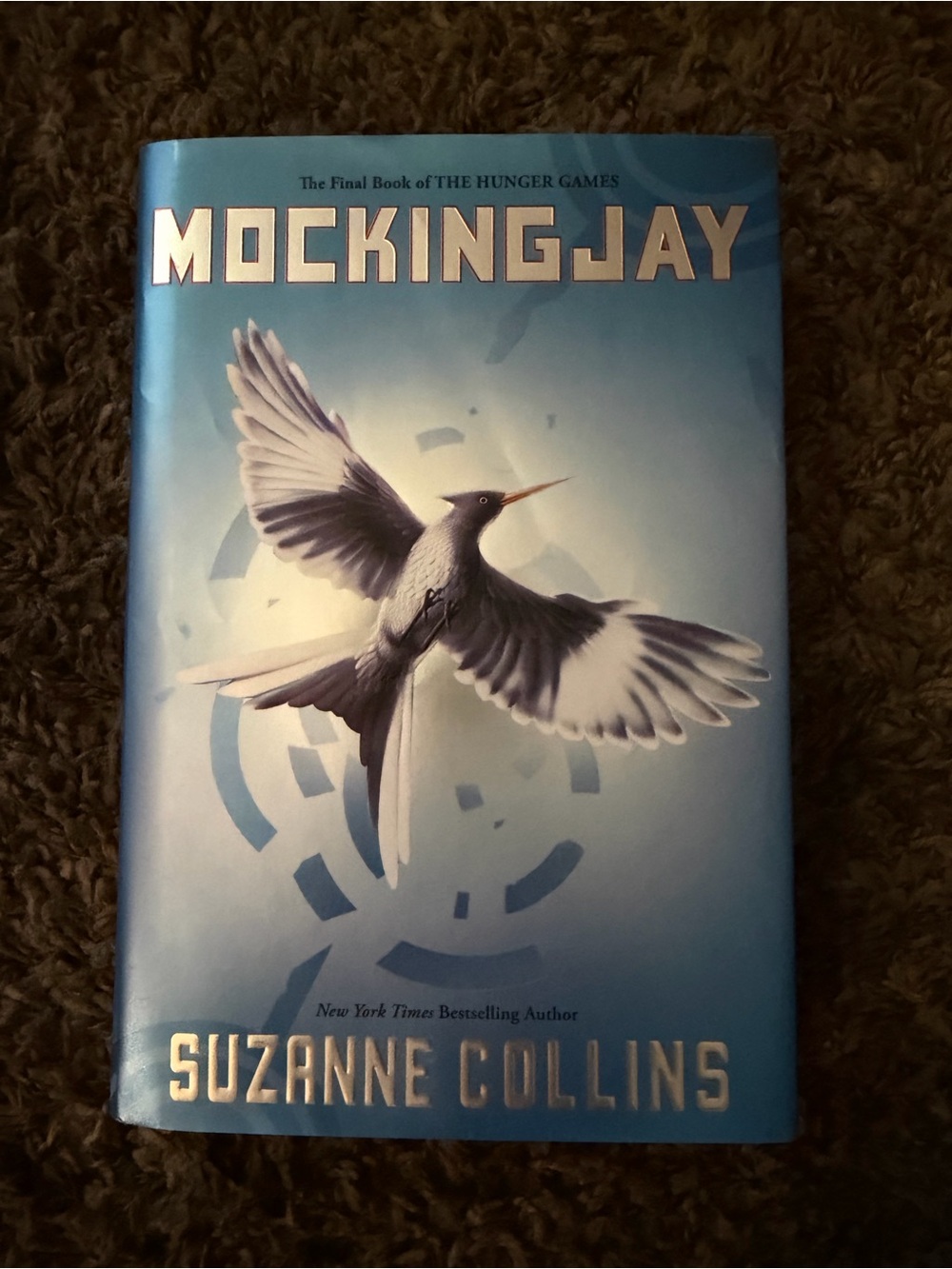 Scholastic Mockingjay Hardcover Book in Blue and White